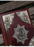 Євангеліє з посрібленими накладками  17х23см