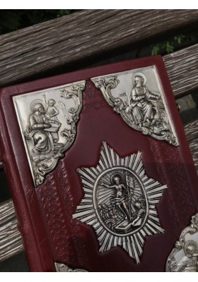 Євангеліє з посрібленими накладками  17х23см
